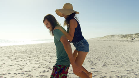man giving a piggyback ride to woman 4k