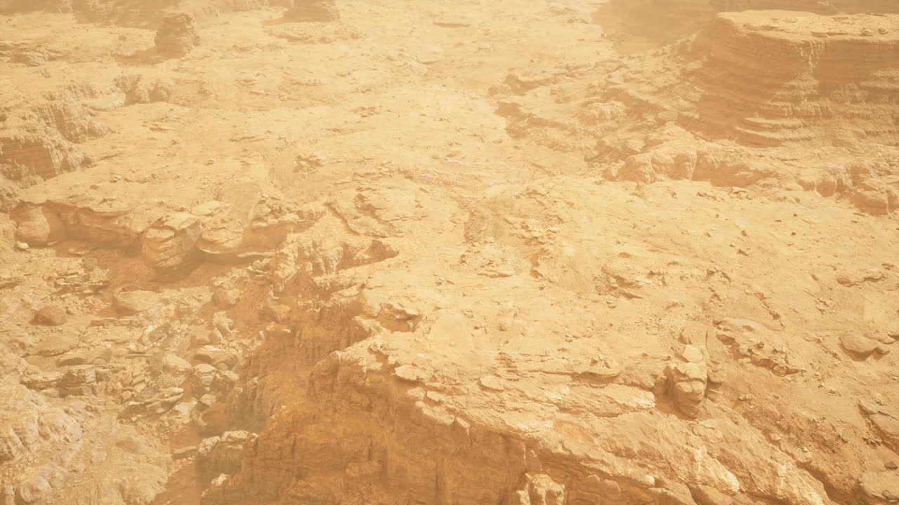 Exploration of an arid landscape with rocky terrain and sandy surfaces