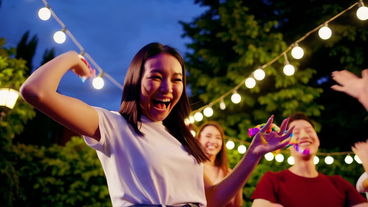 Joyful Friends Celebrate with Confetti at an Outdoor Night Party