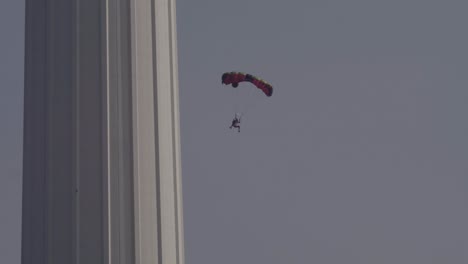 base jumpers jumping from menara tower in kuala lumpur.