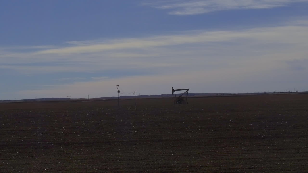 Oil fields and pump jacks in Northeastern Colorado plains Jan 20 2019