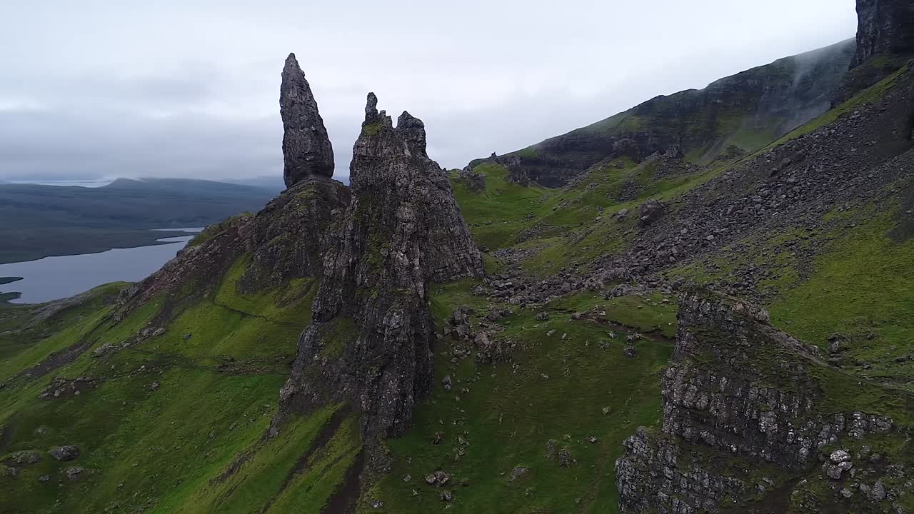 The old man of storr is a scenic place in the isle of skye in scotland. A lot of tourist can be found in this area in summertime. This is a short clip recorded by a drone at the end of july
