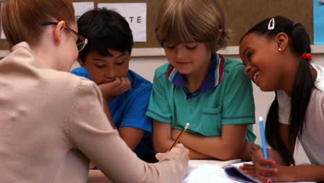 teacher working with her pupils