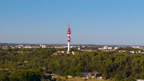 Red-5G-Telecom-Tower-in-Montpellier-Against-a-Clear-Blue-Sky