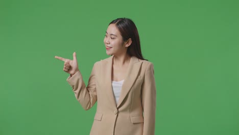 woman in business attire pointing