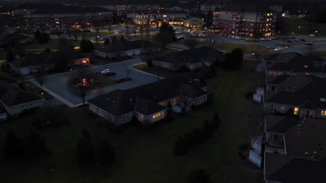 aerial hyperlapse of retirement community with cottages, houses, homes, and assisted living building
