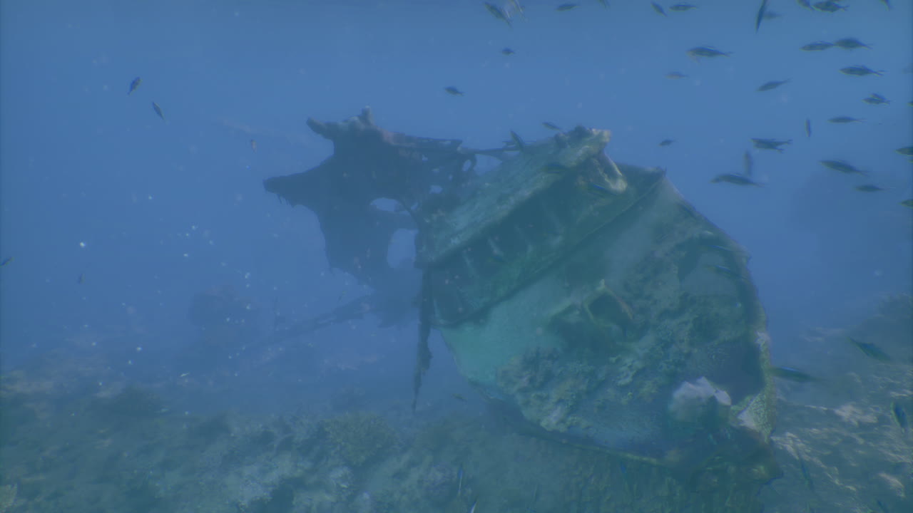 Underwater wreck reveals history of a sunken ship in clear blue waters