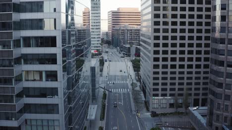 Flying-over-a-downtown-road-in-Los-Angeles-with-empty-streets-in-the-middle-of-the-day-due-to-the-global-pandemic