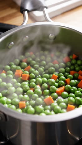 cooking peas and carrots