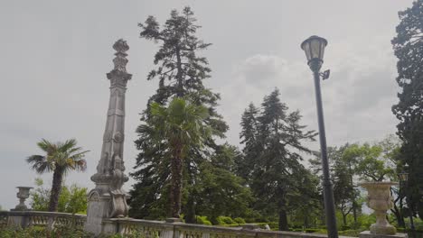 park scene with column and lamppost