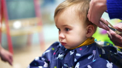 baby getting a haircut