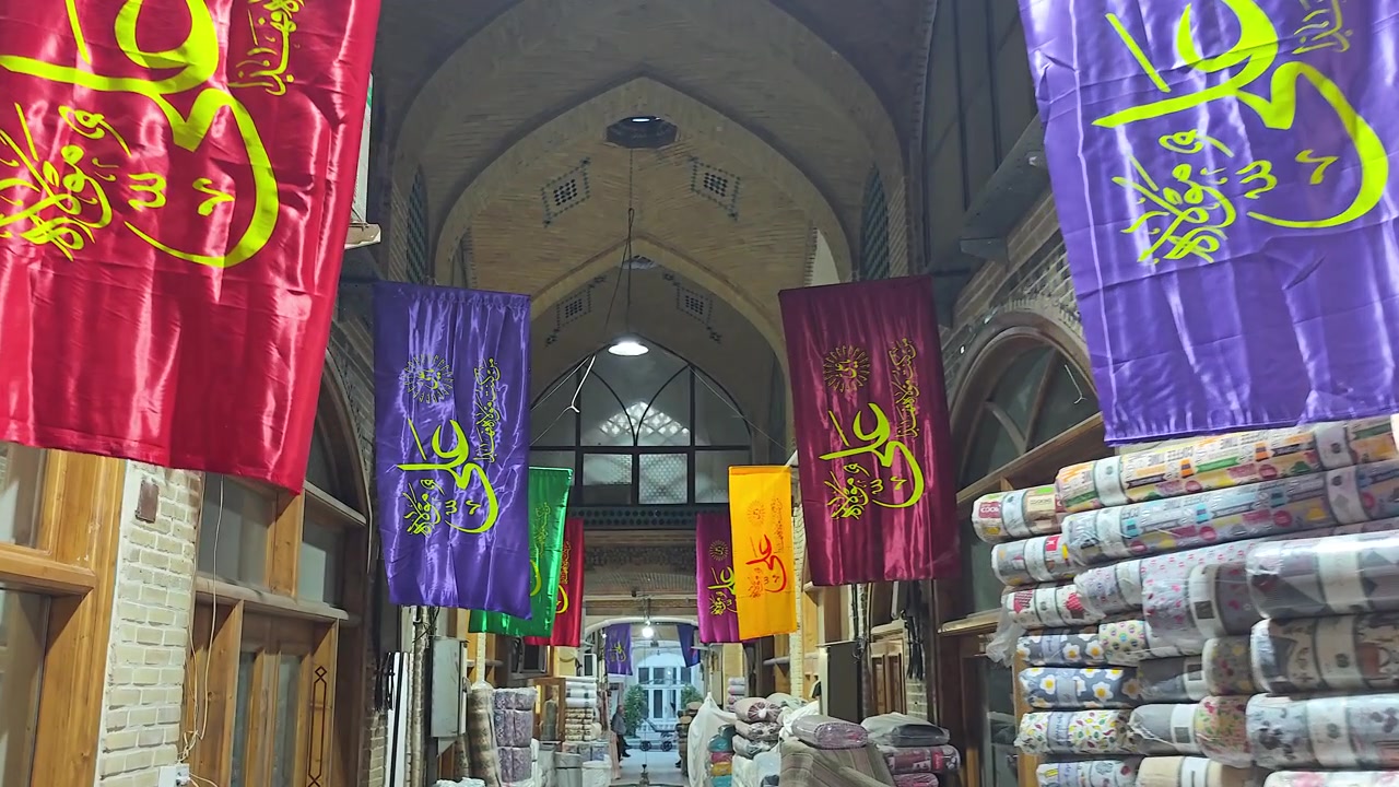 Colorful Religious Banners Hanging in a Traditional Middle Eastern Bazaar