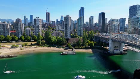 skyscrapers in vancouver skyline near burrard street bridge in british columbia, canada