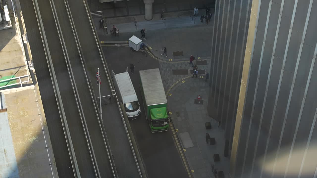 Busy street with people on their way to the job. View from above