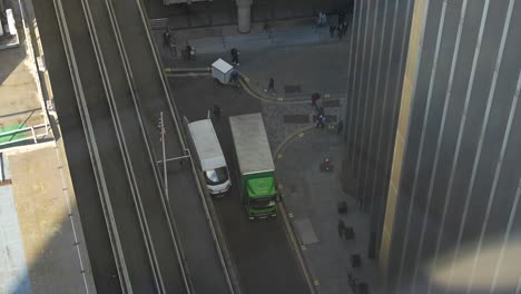 busy street with people on their way to the job. view from above