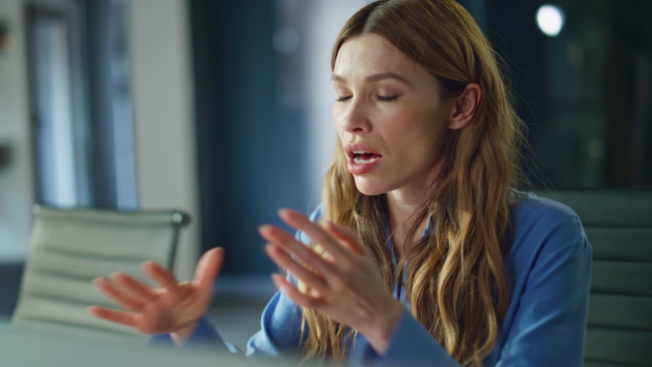 Stressed boss finish video call closing computer lid nervously at office closeup
