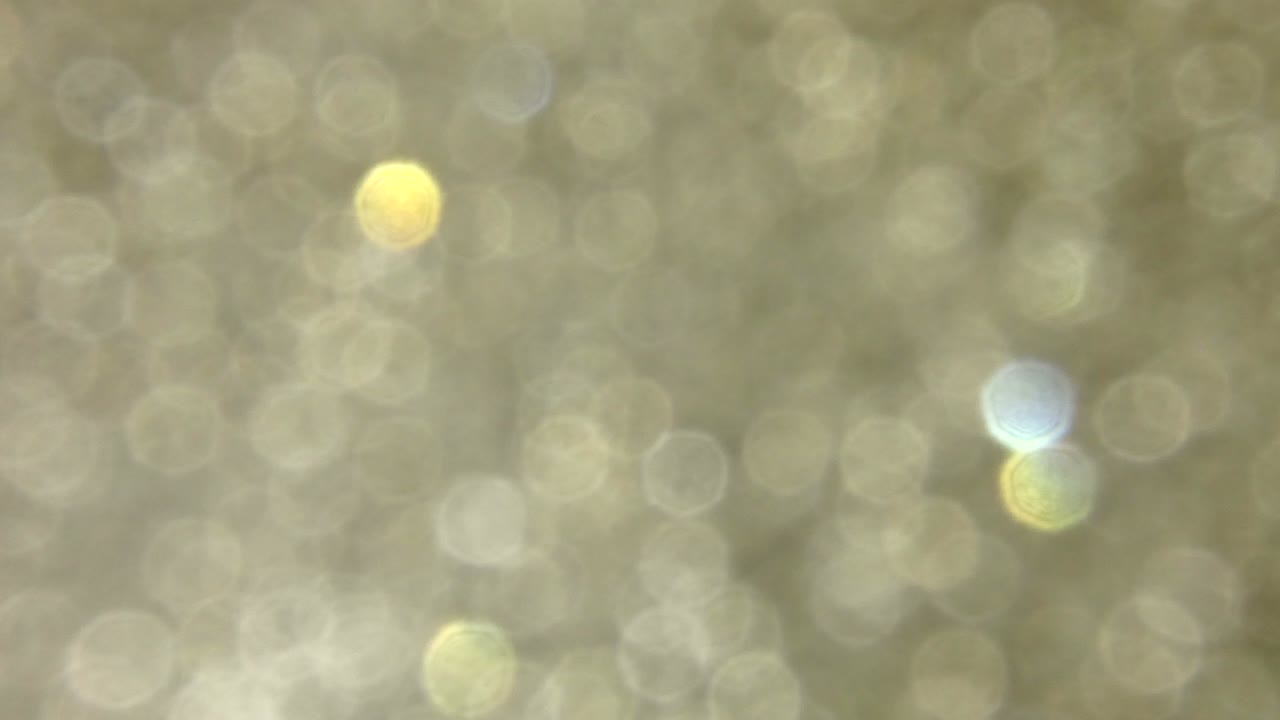 brillantes y rotación luces bokeh glamour y fondo de celebración