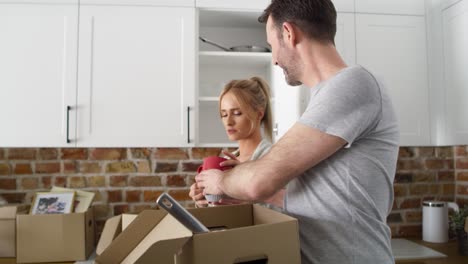 handheld video of couple during moving house