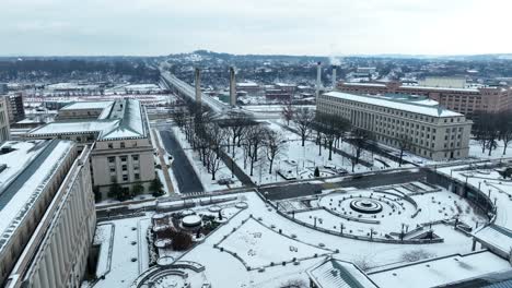 pennsylvania state capitol grounds and complex covered in snow during cold winter in harrisburg