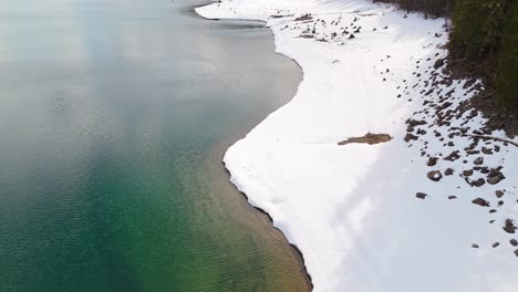 stunning footage of lake kachess with snow in washington state