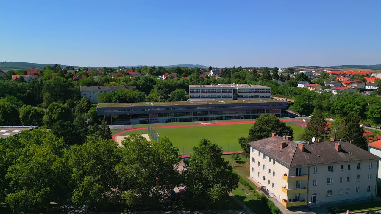 Mistelbach, Nieder&ouml;sterreich, Austria - Numerous Schools are Clustered Around a Central Football Field - Drone Flying Forward