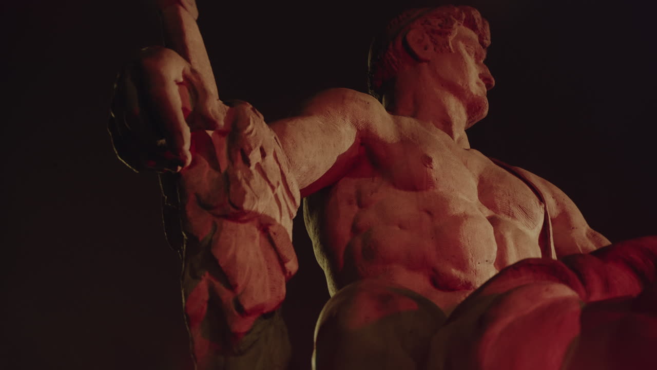 Epic, ancient stone statue at night