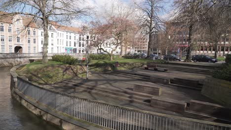 empty terraces at dijle river in leuven, belgium