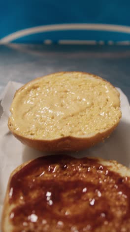 preparation of the burger bread inside a professional kitchen