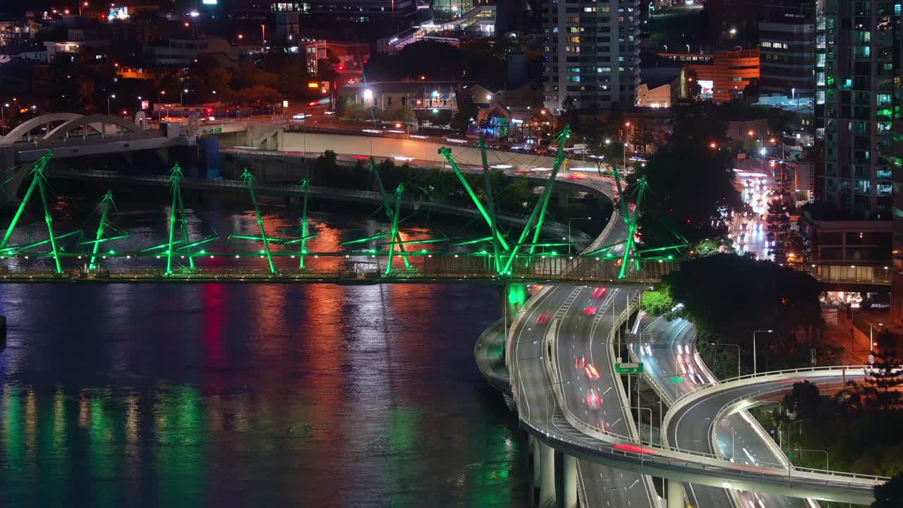 Aerial Night View of Brisbane City with Illuminated Bridge and Traffic