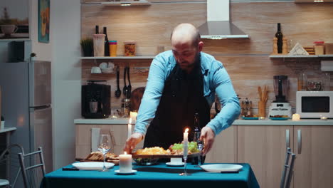 man cooking for his wife