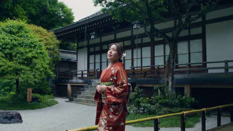 woman in kimono at a japanese temple garden