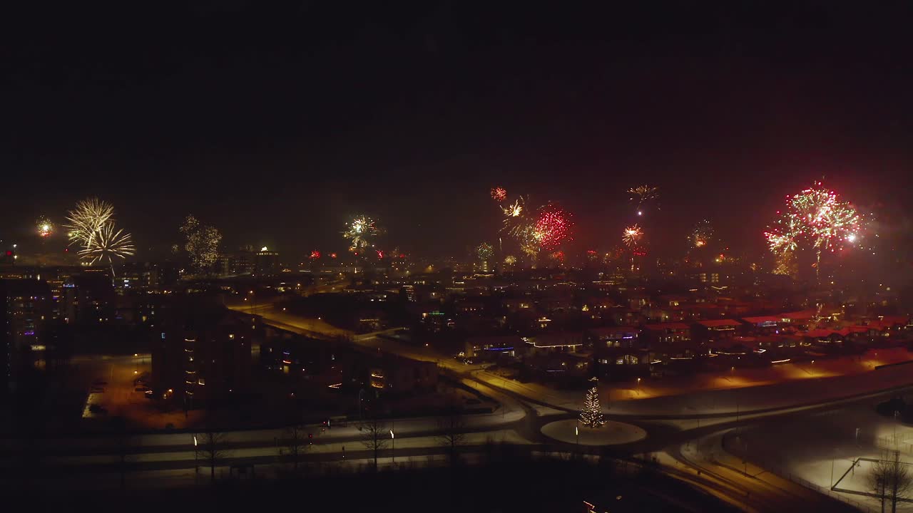 New Year's Eve Fireworks Over a City Skyline, Celebrating the Arrival of the New Year with Stunning Views
