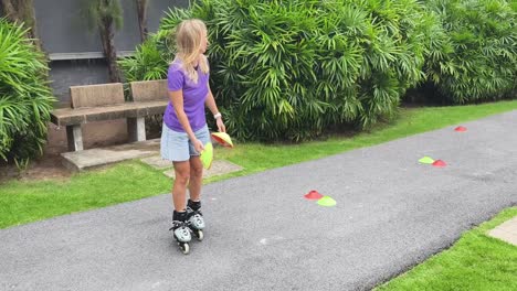 woman roller skating training in park