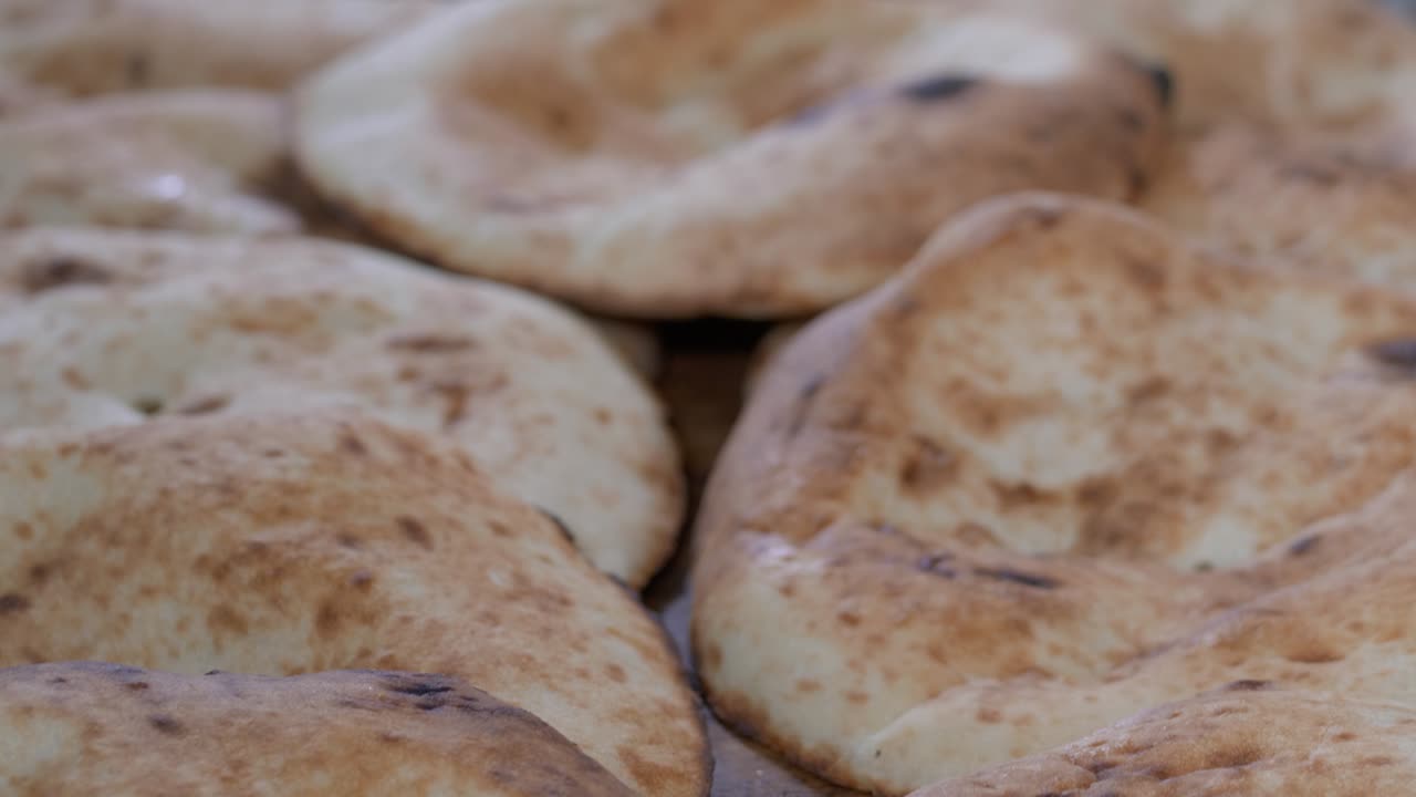 Traditional oriental flat bread from tandoori on the bakery shelf