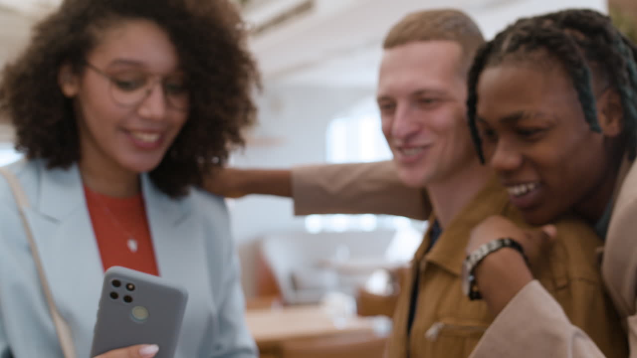 Friends taking a selfie in a modern office