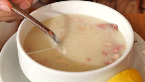 bowl of turkish soup with lemon