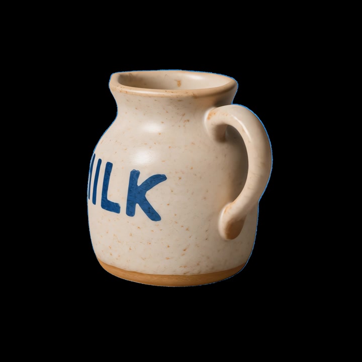 Rotating Ceramic Milk Jug with Blue 'MILK' Text