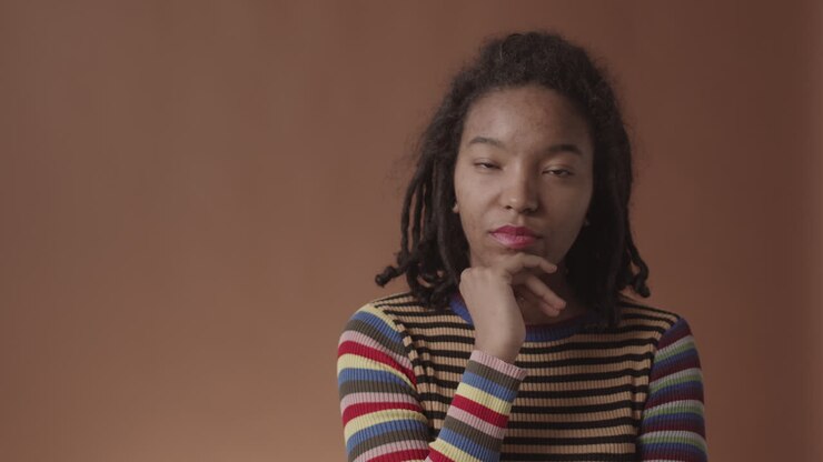 Portrait of Beautiful African-American Woman with Problem Skin