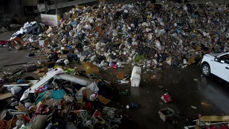 trash piled up in landfill