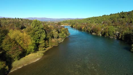 aerial flyover of carrileufu river, crystal-clear water