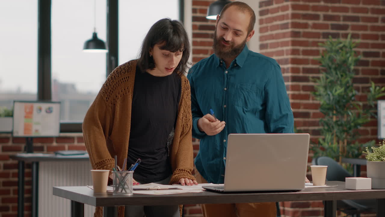 Coworkers collaborating in the office