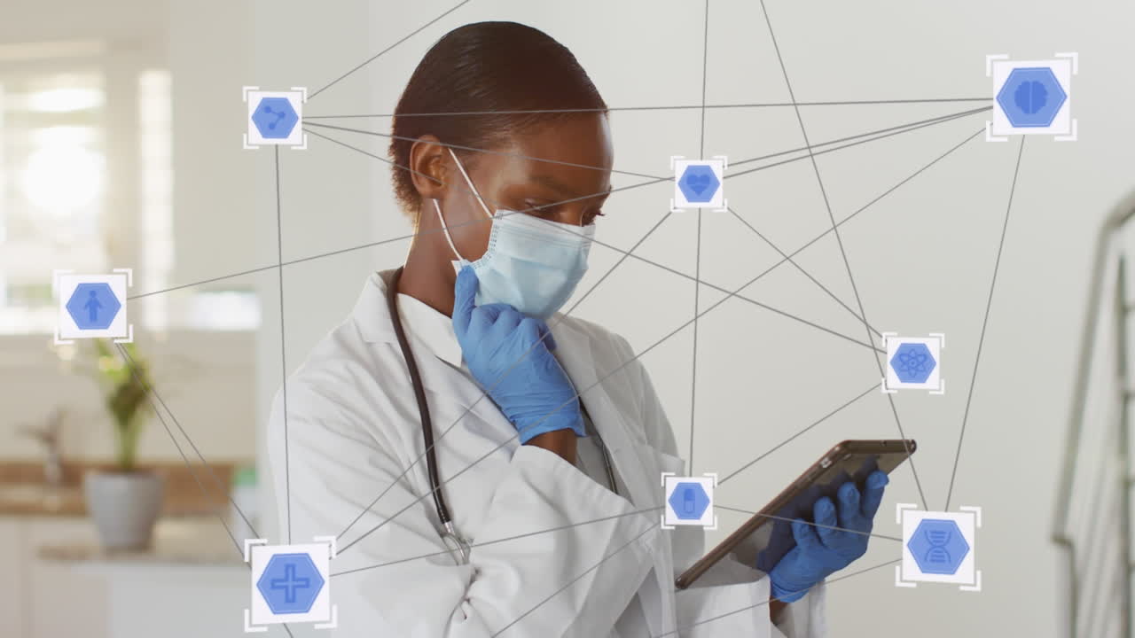 Animation of connections over female african american doctor wearing face mask using tablet