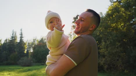 father and daughter in a park