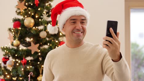 African-American-Man-Holding-Smartphone-Having-Video-Chat-on-Urban-Street-in-City-Guy-Blogger.African-American-man-holding-smartphone-having-video-chat-on-urban-street-in-city.-Guy-blogger-chatting-with-best-friends-in-social-network.-Man-having-virtual-meeting-online-chat-video-call-outdoor