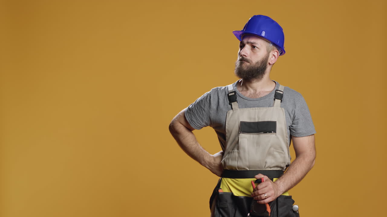 Construction worker brainstorming ideas to work on rebuilding