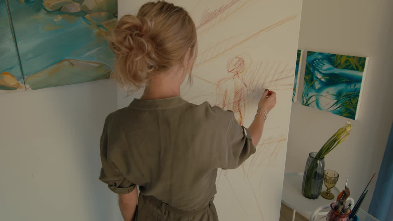 Artist Drawing in Studio