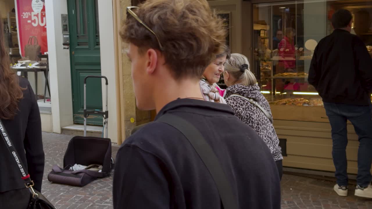 Street Musician Playing Accordion In Old Town of Antibes, France. Slow Motion Shot