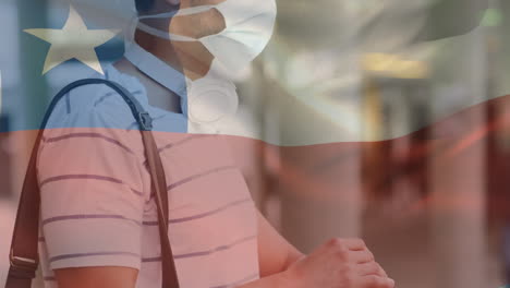 animación de la bandera de chile ondeando sobre un hombre que usa una máscara facial durante la pandemia de covid-19