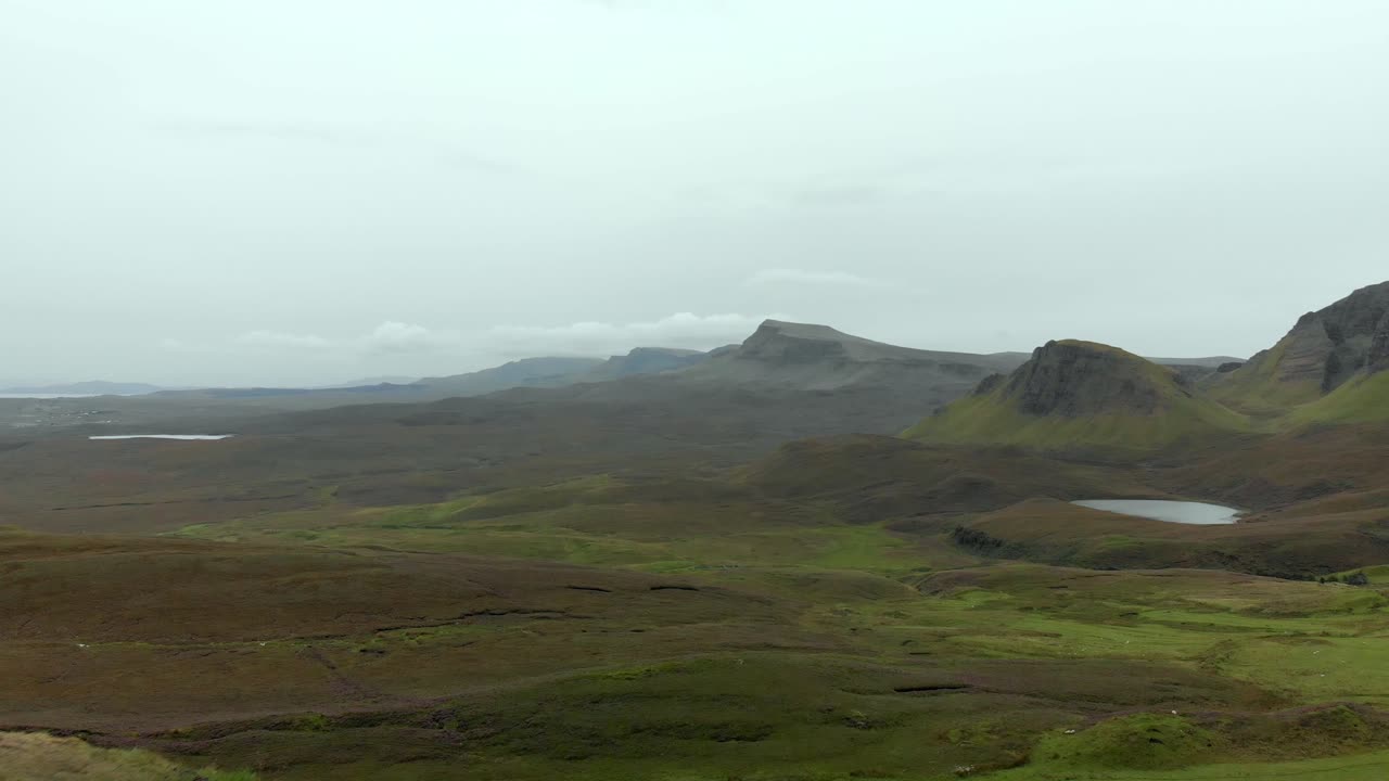 Stunning Aerial footage of the beautiful Quiraing landscape on the Isle of Skye, Scotland, UK. The Quiraing Landslip is on the northernmost summit of the Trotternish on the Isle of Skye, Scotland.