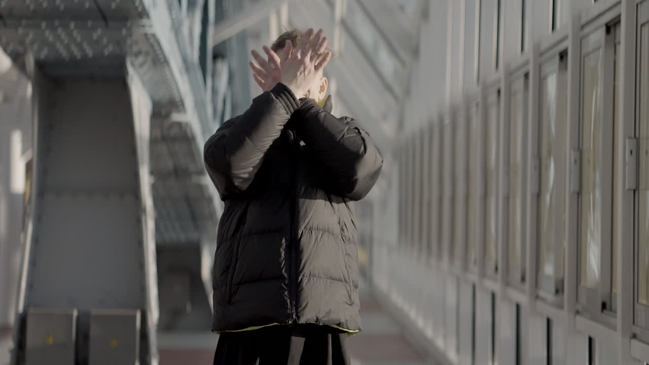 Young Man Posing in Urban Setting